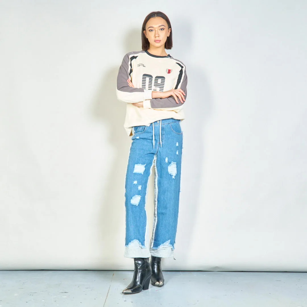 Distressed denim jogger pants with elastic waist wholesale