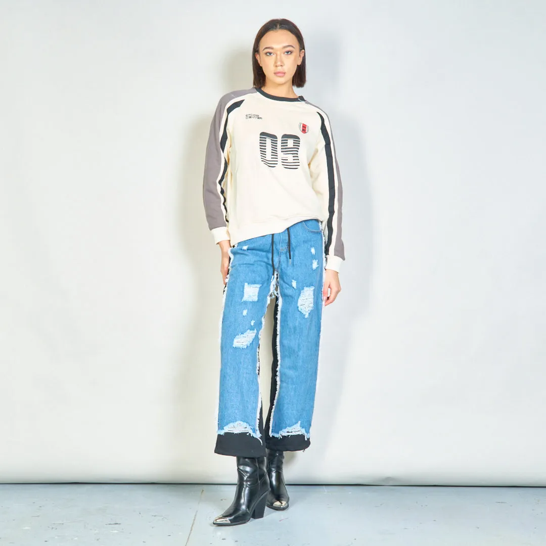 Distressed denim jogger pants with elastic waist wholesale