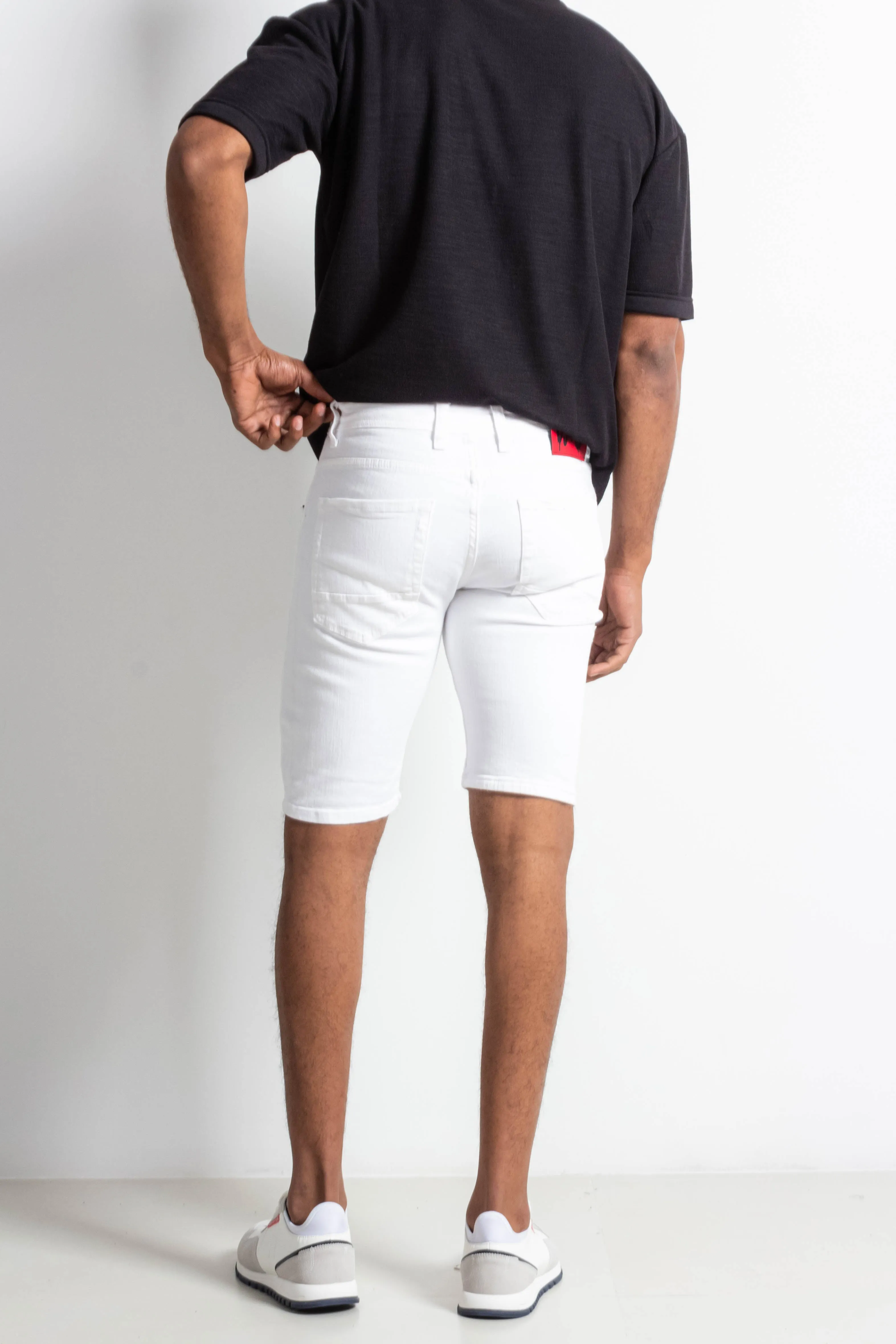 RIPPED DENIM BERMUDA SHORTS