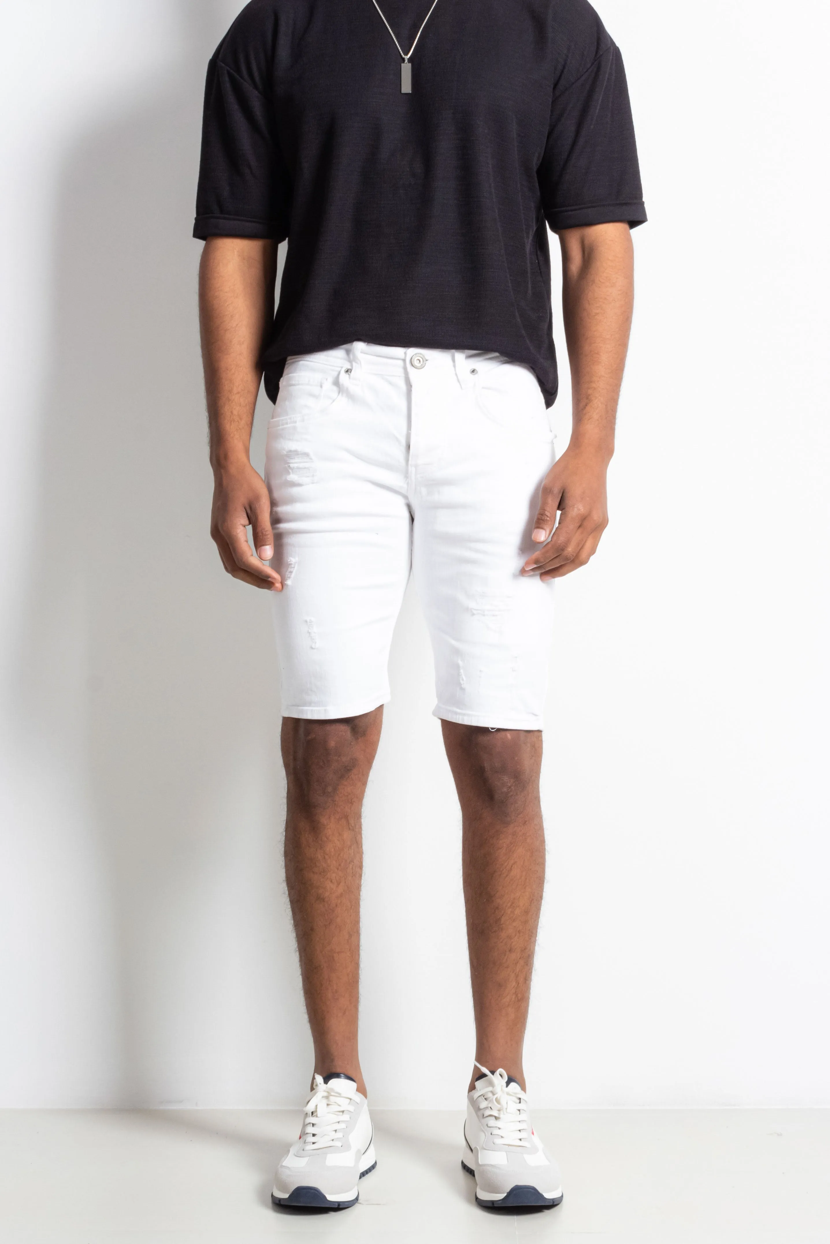 RIPPED DENIM BERMUDA SHORTS